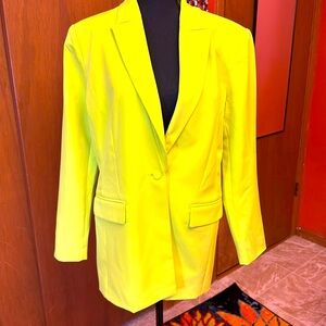A citron, 2024, bought at Dillard’s, woman’s blazer. Inc is the brand. Large